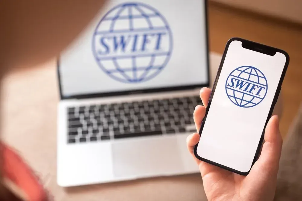BBVA, BNP Paribas, and Citi Back SWIFT’s Blockchain Ledger as Ripple Custody Link Adds Intrigue